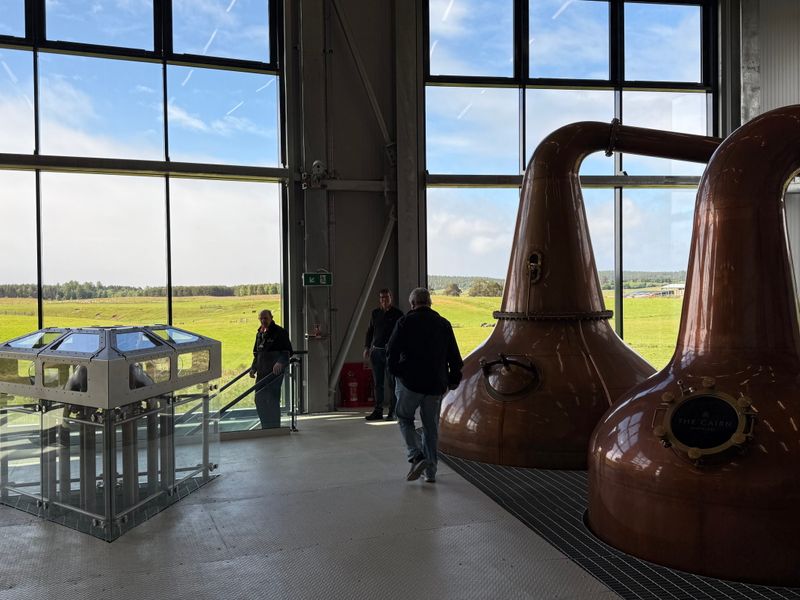 Copper pot stills in a Scottish whisky distillery